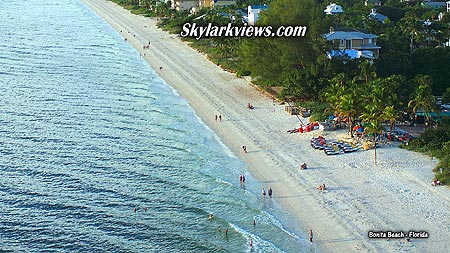 people at the beach in the evening